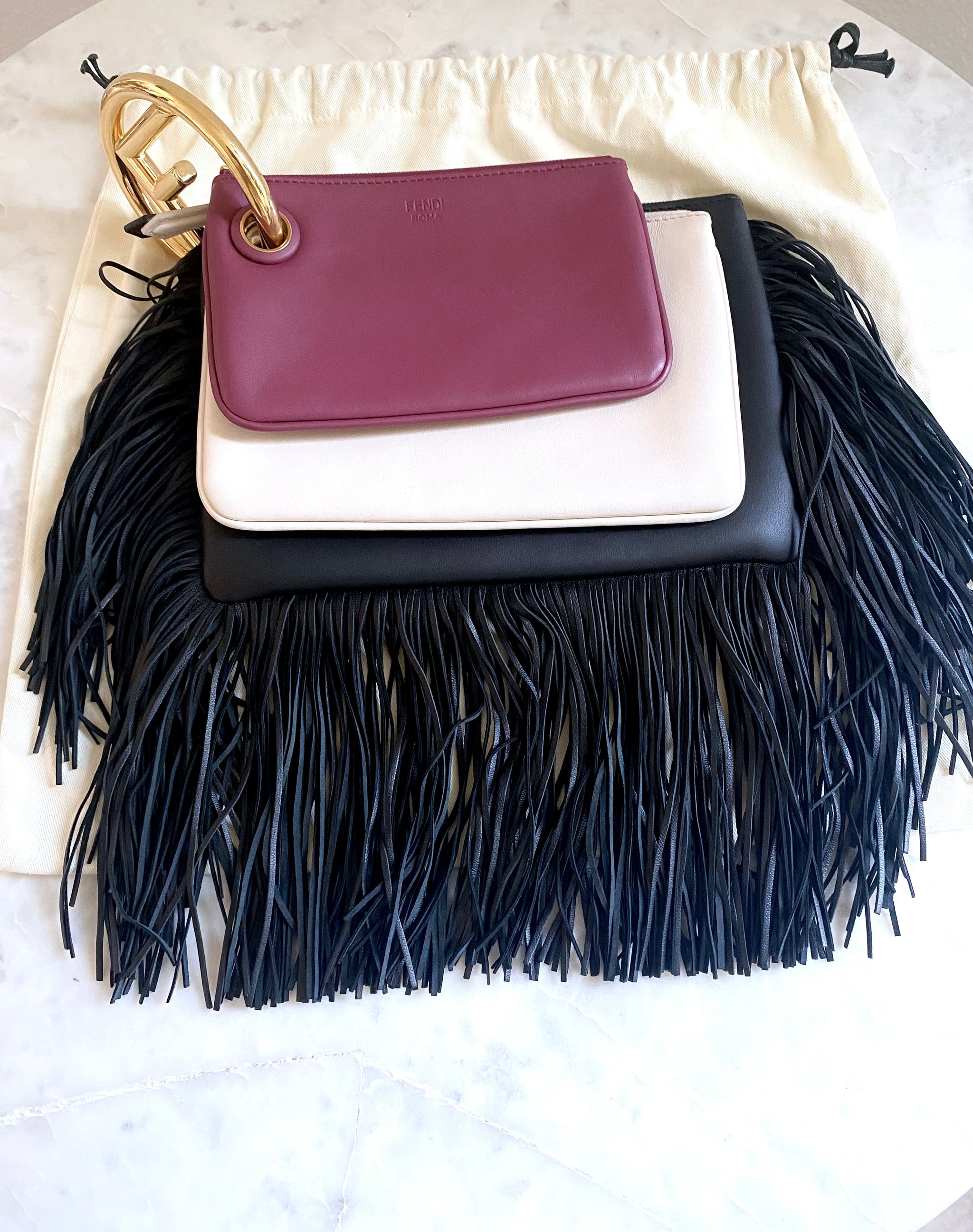 Fendi triplette clutch hotsell